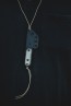 TOPS ALRT XL-03 compact fixed blade knife featuring a black utility blade with a durable angular tip and black canvas micarta handles.