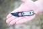 TOPS ALRT XL-05 compact fixed blade knife featuring a black hunter's point blade shape and black canvas micarta handles.