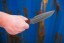 Viking Tactics Norseman knife with tan and green Micarta handle featuring blood red liners and Tungsten Cerakote blade.